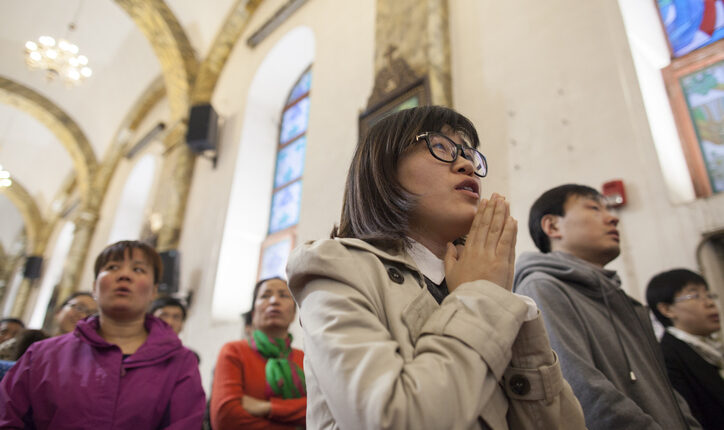 Worshiper at Cathedral of the Immaculate Conception