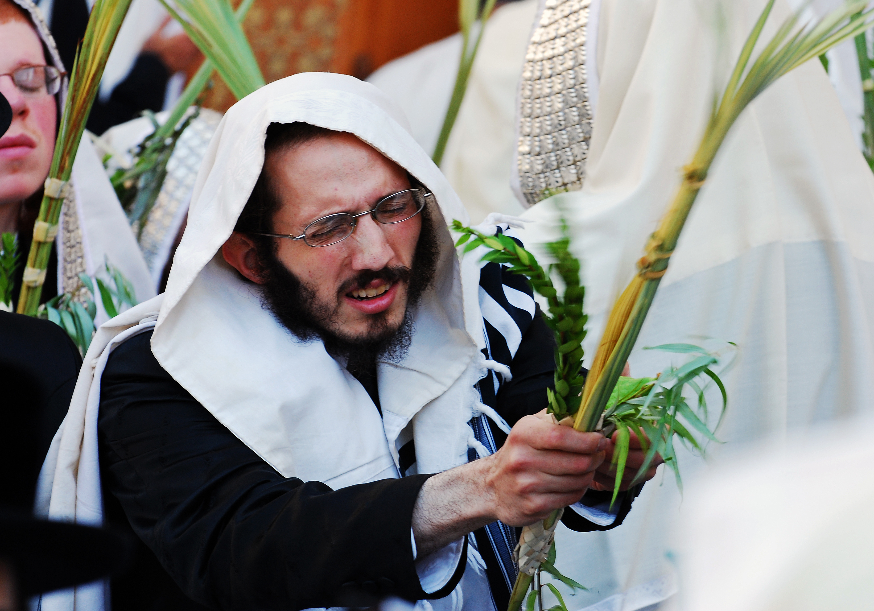 shaking a Lulav during the Festival of Sukkot. - Catholic Digest